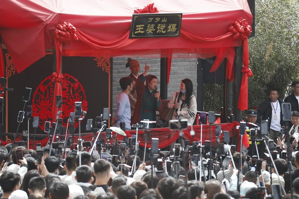 "Granny Wang" interacts with participants on stage in Kaifeng, on 30 March 2024. (CNS)