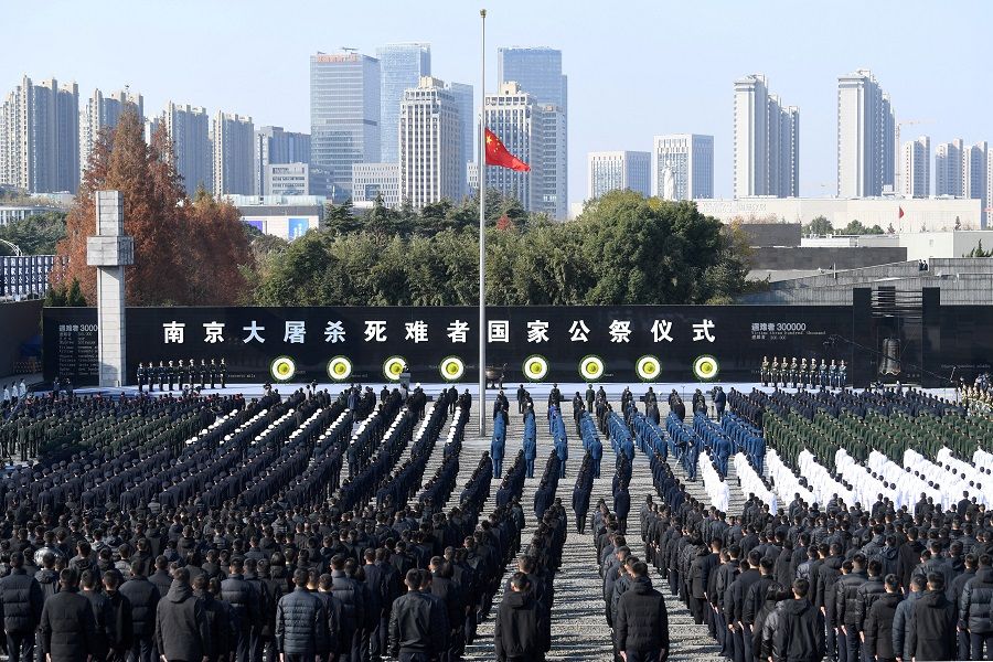The Chinese flag flies at half mast during the national memorial ceremony for the Nanjing Massacre victims, in Nanjing, Jiangsu province, China, 13 December 2021. (CNS photo via Reuters)