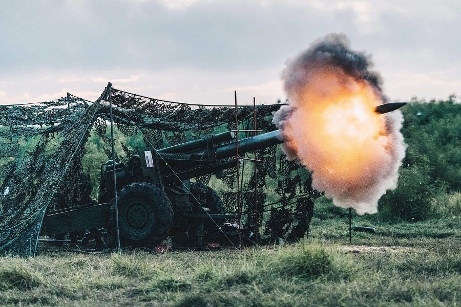 This Taiwan's Ministry of National Defense handout picture taken and released on 24 August 2022 shows a US-made 155mm howitzer firing during a drill at Penghu islands. (Handout/Taiwan's Ministry of National Defense/AFP)