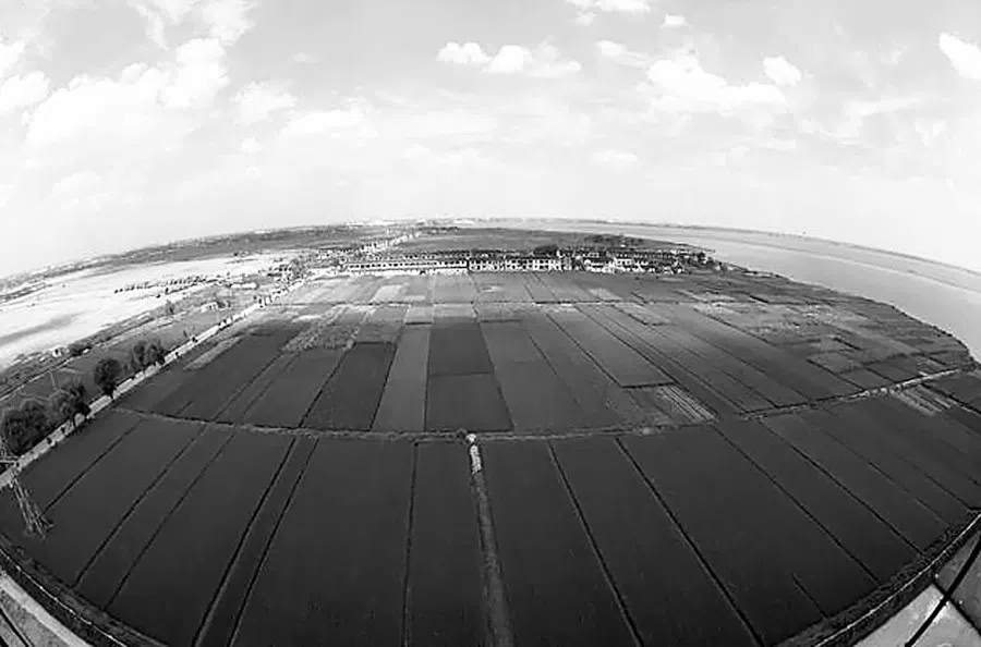 West side of Jinji Lake prior to construction. Development of the SIP started from the west bank of the Jinji Lake. Over the years, the Jinji Lake developed into a vibrant Central Business District that boasts a mixture of development spanning commercial, residential and cultural uses. (SIP Administrative Committee)