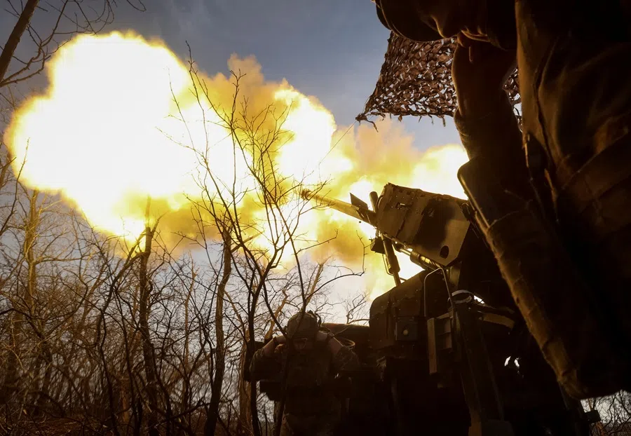 Servicemen of the 148th Separate Artillery Zhytomyr Brigade of the Armed Forces of Ukraine fire a Caesar self-propelled howitzer towards Russian troops at a position on the front line, amid Russia's attack on Ukraine, near the frontline town of Pokrovsk in Donetsk region, Ukraine, on 23 November 2025.