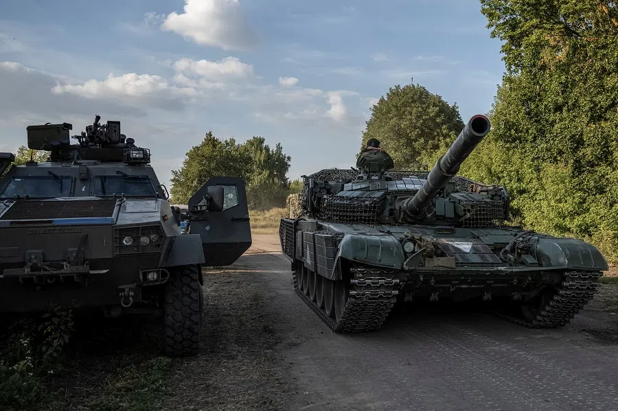 Ukrainian servicemen ride a tank, amid Russia’s attack on Ukraine, near the Russian border in Sumy region, Ukraine, 16 August 2024. (Viacheslav Ratynskyi/Reuters)