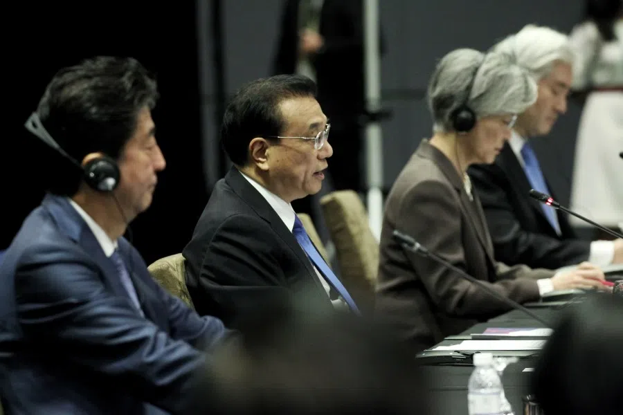 Japanese Prime Minister Shinzo Abe, Chinese Premier Li Keqiang, and Korean Foreign Minister Kang Kyung-Wha at the ASEAN +3 meeting in 2018. (SPH)