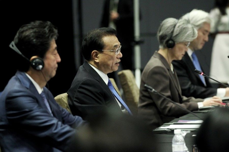 Japanese Prime Minister Shinzo Abe, Chinese Premier Li Keqiang, and Korean Foreign Minister Kang Kyung-Wha at the ASEAN +3 meeting in 2018. (SPH)