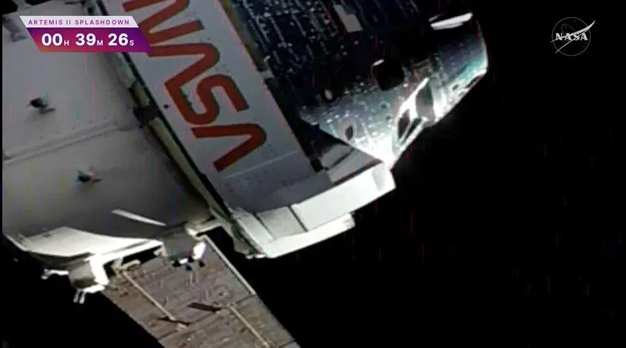 The Artemis II crew capsule is seen in this screengrab from a livestream video minutes after a hot‑fire test, as it prepares for separation from its service module ahead of re‑entry to earth following the Artemis II crew's flyby of the moon on 10 April 2026.