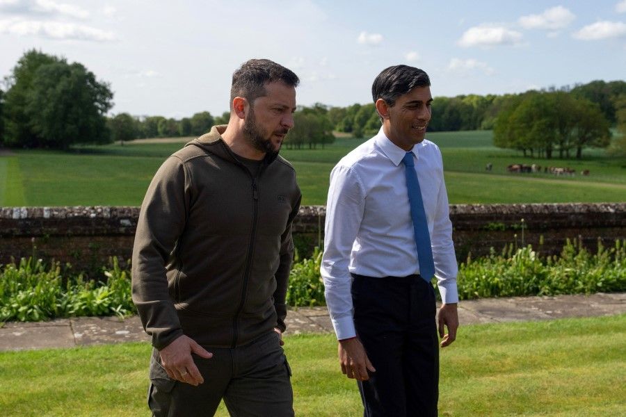 UK Prime Minister Rishi Sunak (right) and Ukraine's President Volodymyr Zelenskyy walk in the garden at Chequers on 15 May 2023 in Aylesbury, England. In recent days, Zelenskyy has travelled to meet Western leaders seeking support for Ukraine in the war against Russia. (Carl Court/Pool via Reuters)