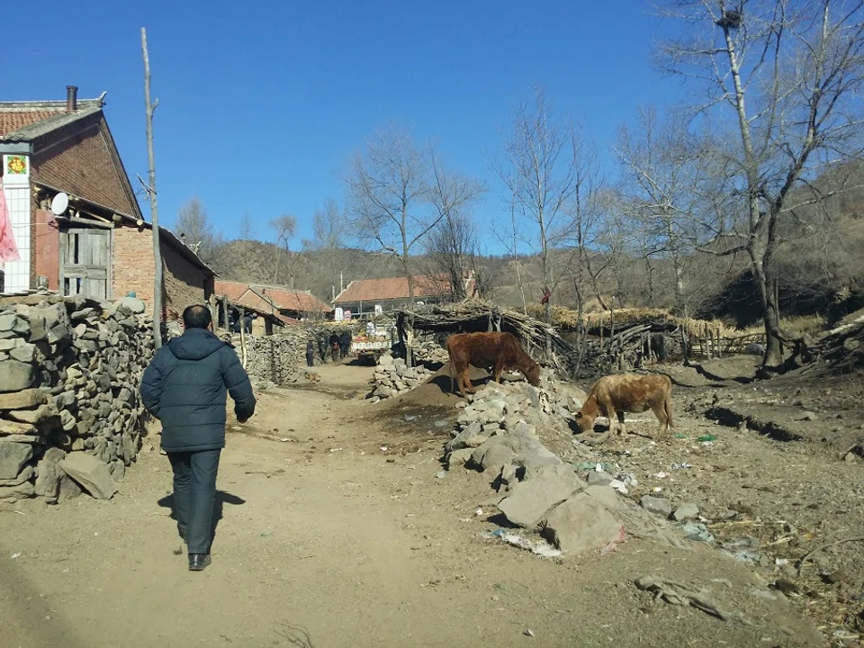 A road along Qidaoliang village located in a deep valley in Hebei province, China, 2014. (SPH)