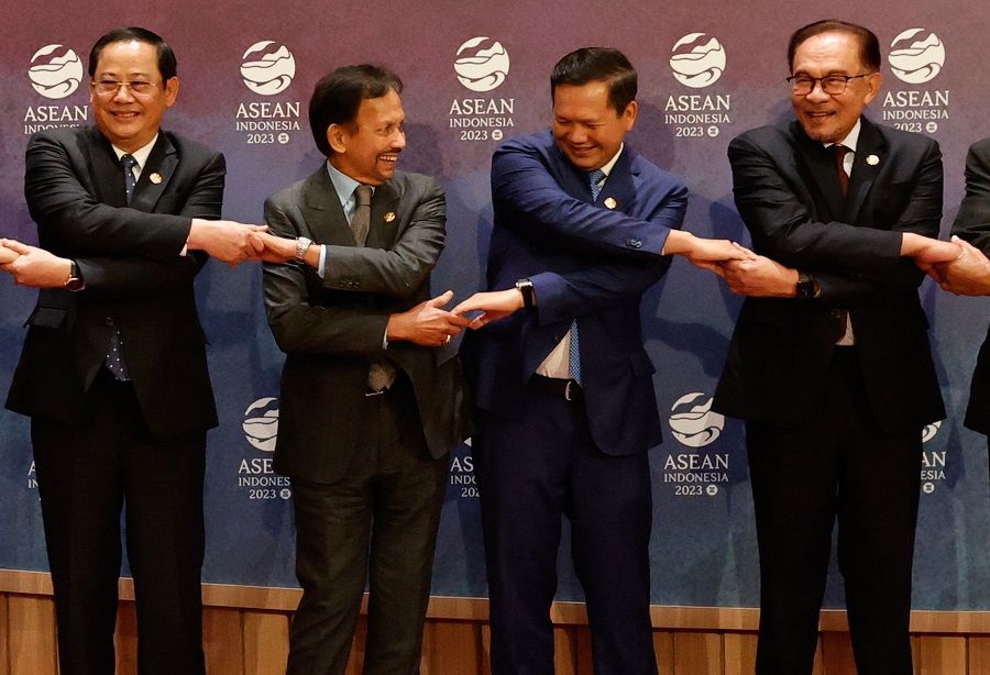 From left: Laos' Prime Minister Sonexay Siphandone, Brunei's Prime Minister Hassanal Bolkiah, Cambodia's Prime Minister Hun Manet and Malaysia's Prime Minister Anwar Ibrahim pose for a group photo before the ASEAN-Australia Summit, held as part of the 43rd ASEAN Summit in Jakarta, Indonesia, on 7 September 2023. (Willy Kurniawan/Pool/AFP)