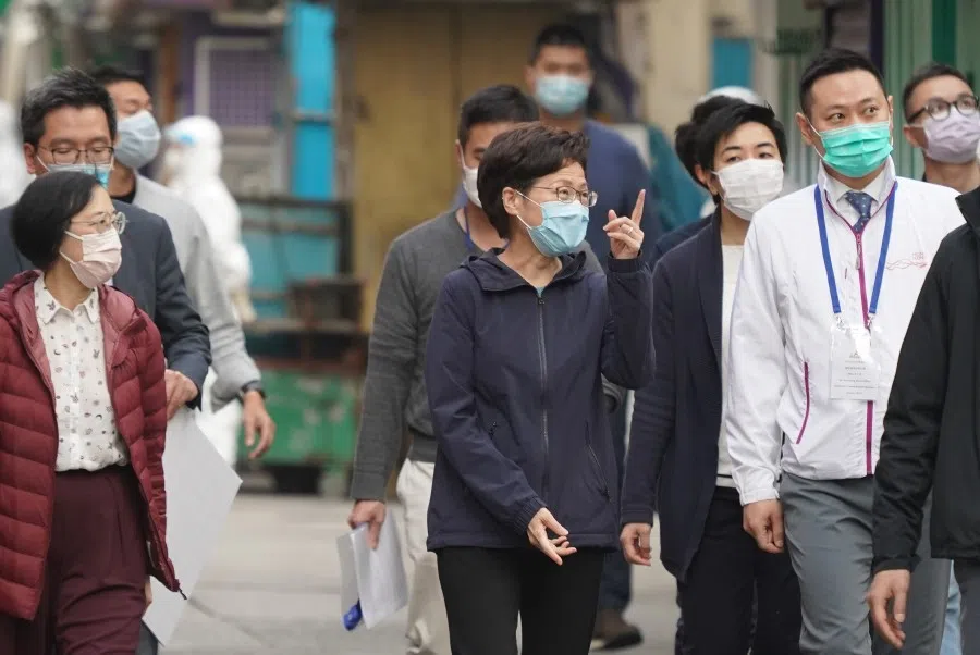Hong Kong Chief Executive Carrie Lam (centre) visiting Hong Kong's Jordan district following its lockdown, 23 January 2021. (CNS)