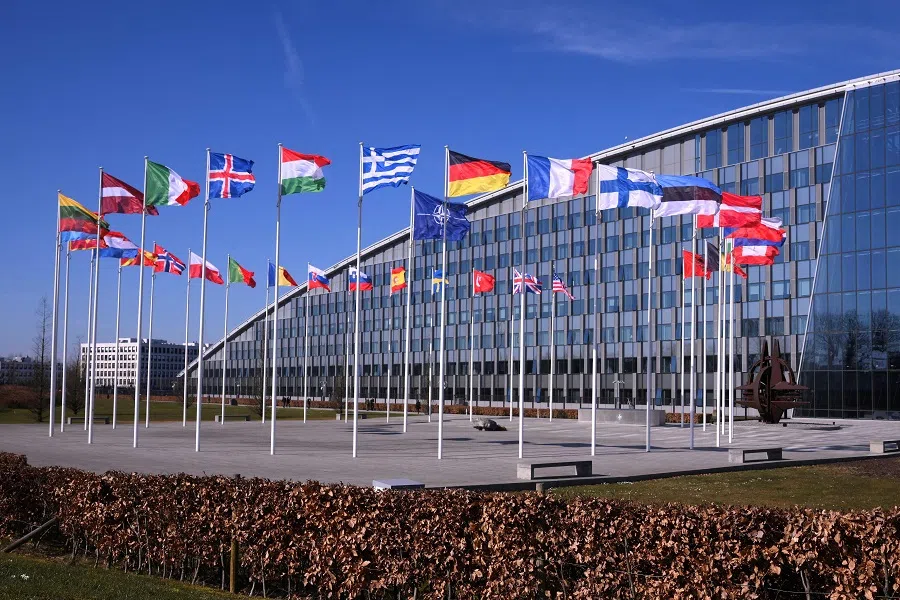This photograph taken on 6 March 2025 shows the member nation flags in the Cour d’Honneur of the The North Atlantic Treaty Organization (NATO) headquarters in Brussels. (John Thys/AFP)