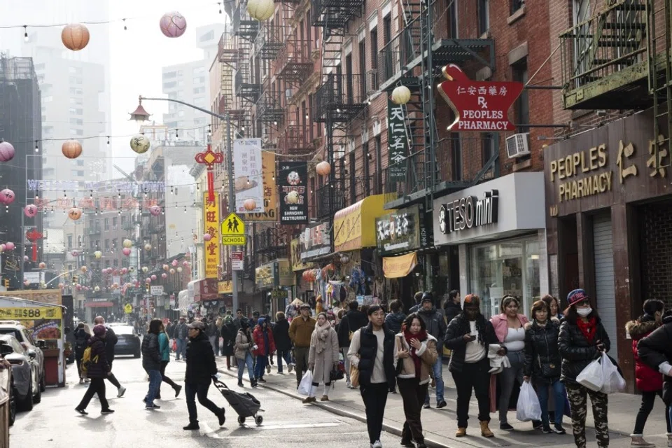 Pedestrians in the Chinatown neighborhood of New York, US, on 26 December 2023. (Eilon Paz/Bloomberg)