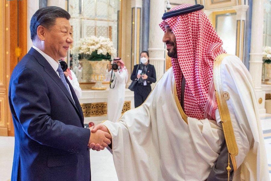 This handout picture released by the Saudi Press Agency SPA shows Saudi Crown Prince Mohammed bin Salman (right) shaking hands with Chinese President Xi Jinping during the China-Arab Summit in the Saudi capital Riyadh, on 9 December 2022. (SPA/AFP)