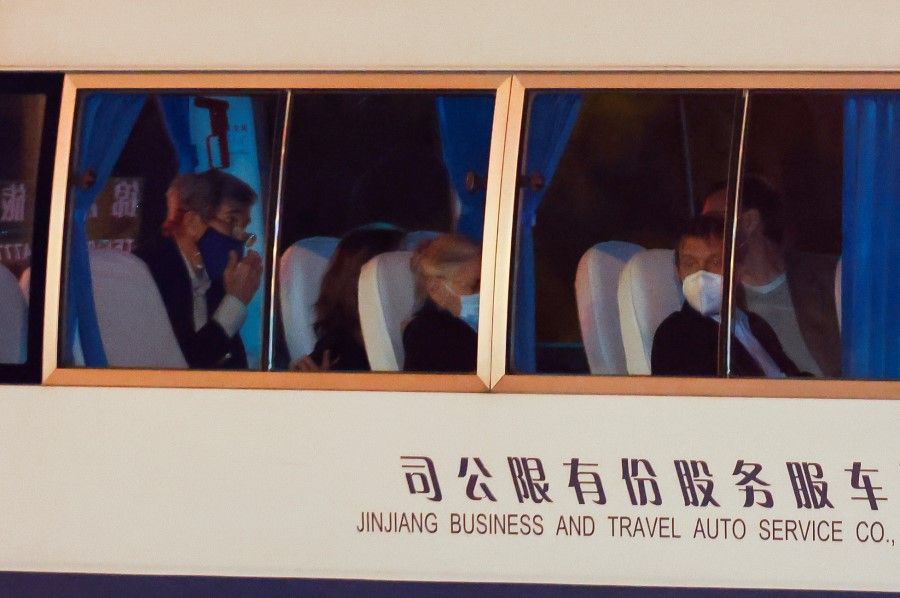 A vehicle with US special presidential envoy for climate John Kerry on board arrives to a state guest hotel in Shanghai, China, 14 April 2021. (Aly Song/Reuters)