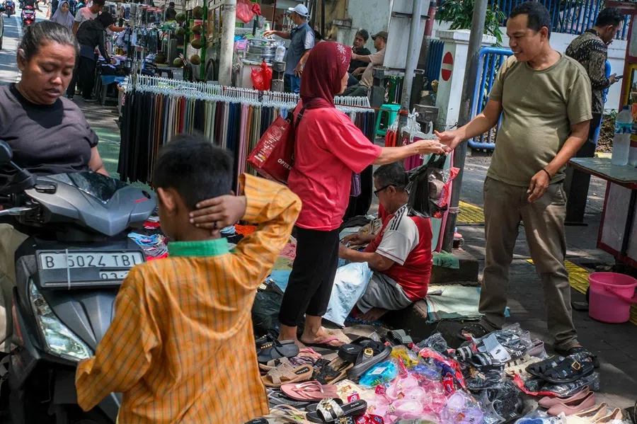 Shoppers at a street market in Jakarta, Indonesia on 12 September 2025. (Bay Ismoyo/AFP)