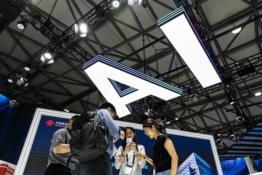 Signage for artificial intelligence at the China Unicom Hong Kong Ltd. booth at the MWC Shanghai tech show in Shanghai, China, on 19 June 2025.