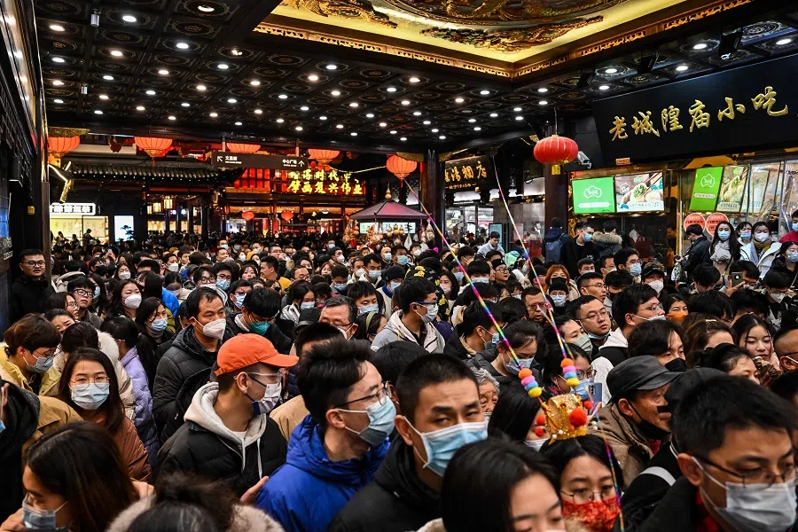 People visit the Yu Garden in Shanghai, China, on 5 February 2023. (Hector Retamal/AFP)