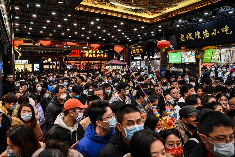 People visit the Yu Garden in Shanghai, China, on 5 February 2023. (Hector Retamal/AFP)