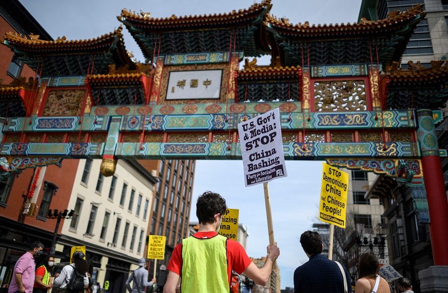 People participate in an 'Anti-Asian Hate' rally in Chinatown in Washington, DC, US, on 27 March 2021. (Andrew Caballero-Reynolds/AFP)