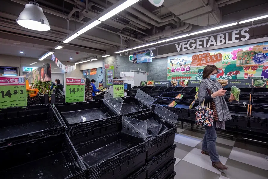 Empty shelves in the vegetable section at a supermarket in Hong Kong, China, on 8 February 2022. (Paul Yeung/Bloomberg)