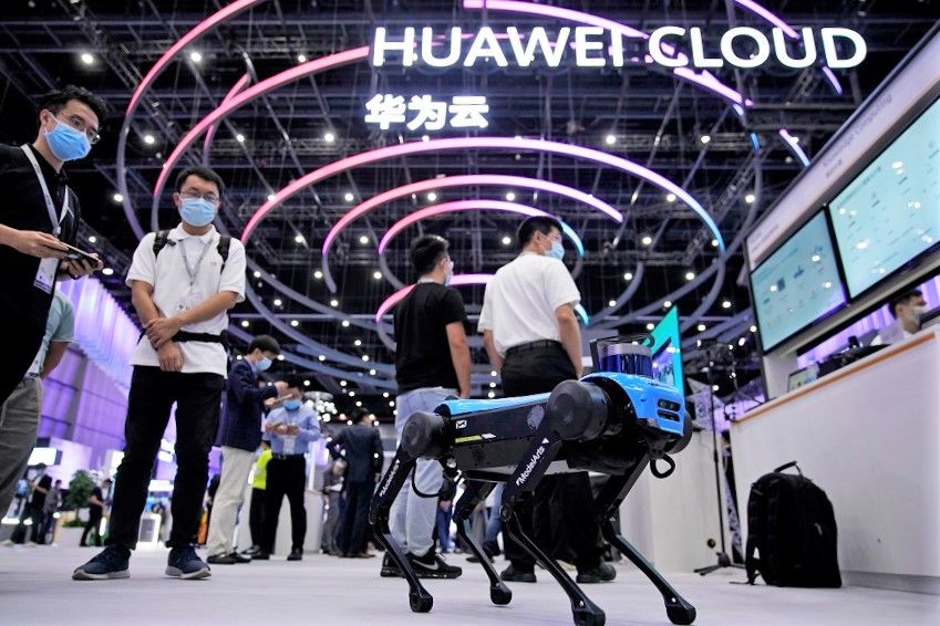 A robotic dog powered by Huawei Cloud is seen at a booth during Huawei Connect in Shanghai, China, 23 September 2020. (Aly Song/Reuters)
