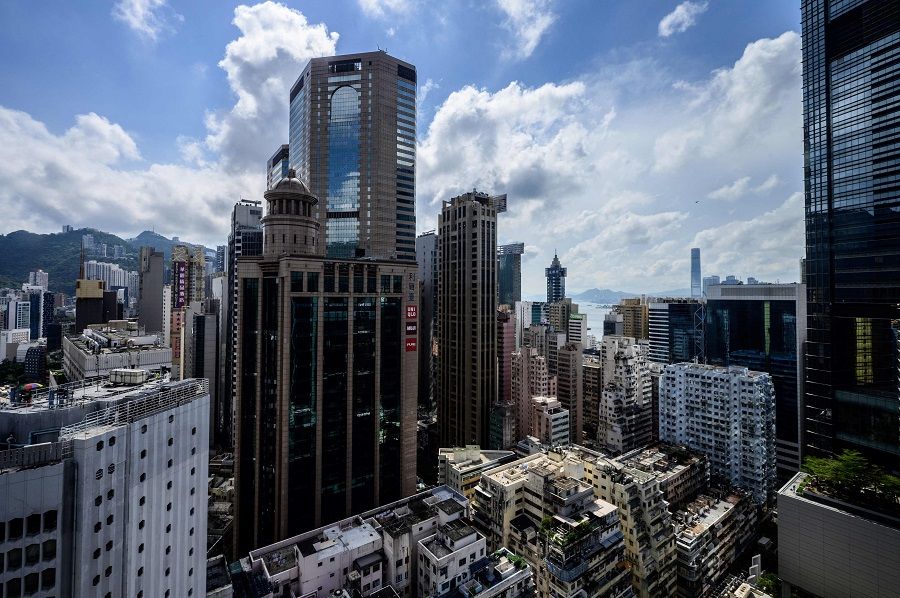 This general view shows residential and commercial buildings in the Causeway Bay district of Hong Kong Island in Hong Kong on 14 May 2021. (Anthony Wallace/AFP)