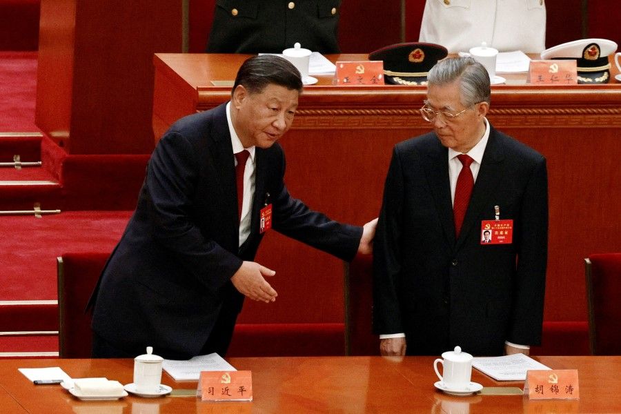 Chinese President Xi Jinping and former President Hu Jintao attend the opening ceremony of the 20th National Congress of the Communist Party of China, at the Great Hall of the People in Beijing, China, 16 October 2022. (Thomas Peter/Reuters)