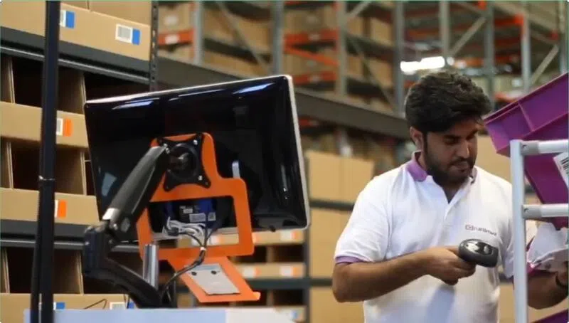  A local employee at Quicktron Robotics’ storage center in Dubai.  (Photo provided by interviewee)