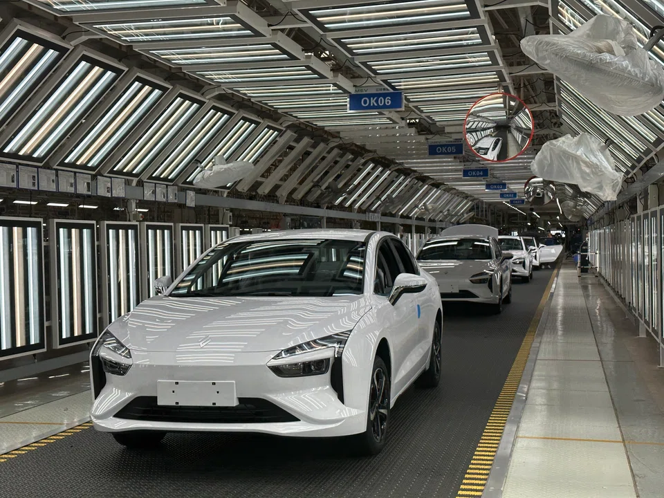 Jiangling Motors new energy vehicles ready for export. (Daryl Lim/SPH Media)