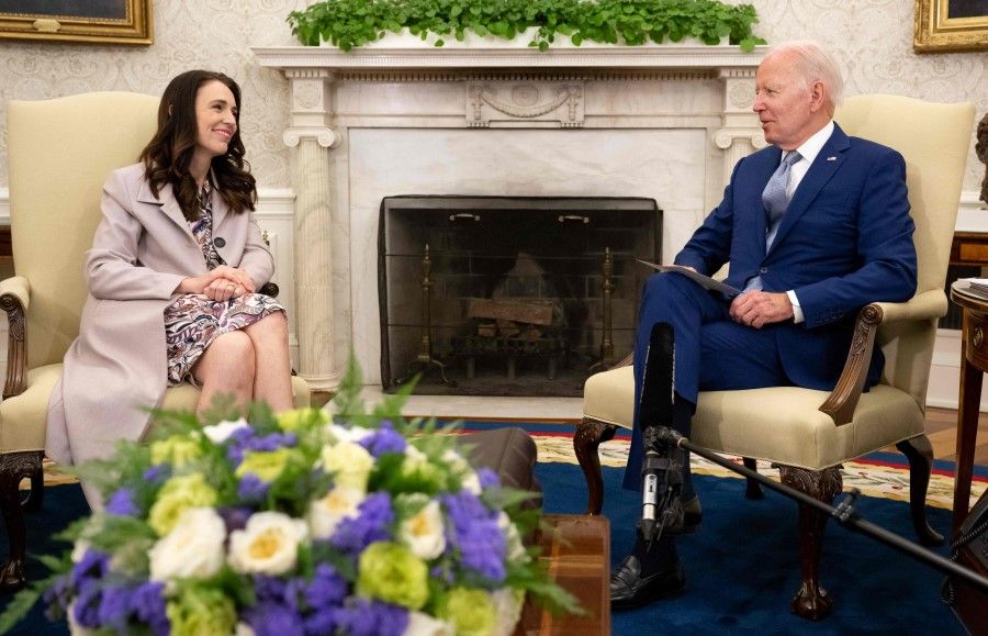 US President Joe Biden (right) meets with Prime Minister Jacinda Ardern, of New Zealand, in the Oval Office of the White House in Washington, DC, on 31 May 2022. (Saul Loeb/AFP)