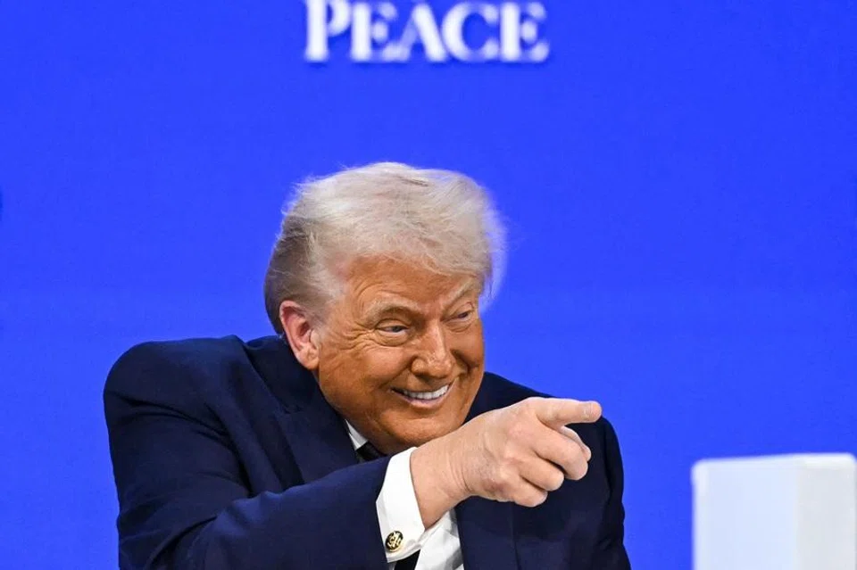 US President Donald Trump gestures as he speaks at the "Board of Peace" meeting during the World Economic Forum (WEF) annual meeting in Davos on 22 January 2026. (Fabrice Coffrini/AFP)