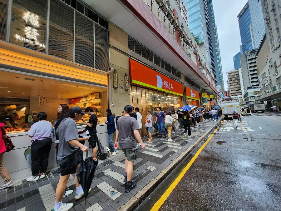 Long queues appear outside the Kwun Tong branch of the popular two-dish-rice eatery Kwun Fat Kitchen, in Hong Kong, July 2023. (SPH Media)