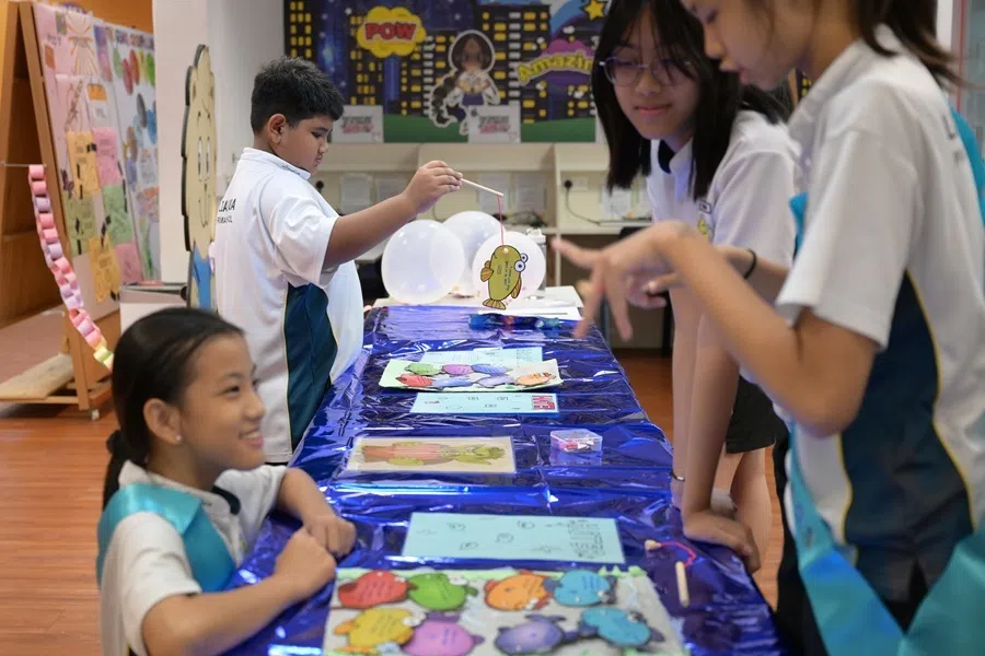 Lianhua Primary pupils playing a game to learn more about cyberbullying as they celebrate Kindness Day on 13 May 2025. 
