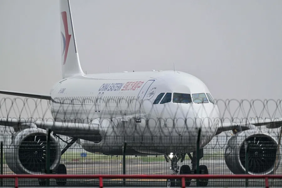 A China Eastern Airlines Airbus A320neo aircraft taxis at Shanghai Hongqiao International Airport in Shanghai on 14 July 2025. (Hector Retamal/AFP)