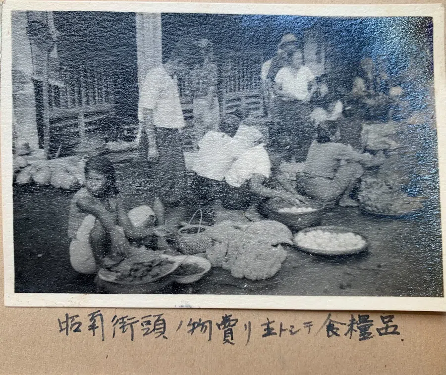 Vegetable sellers on the street in Singapore, late February 1942.