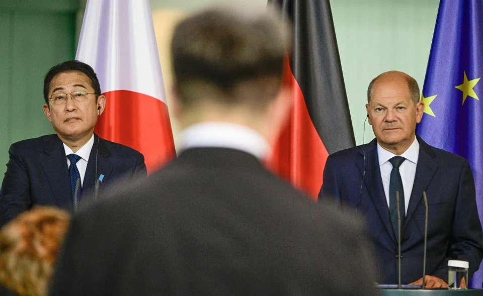 German Chancellor Olaf Scholz (right) and Japanese Prime Minister Fumio Kishida attend a press conference after talks in Berlin, Germany, 12 July 2024. (John MacDougall/AFP)