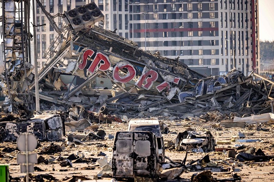 A picture taken on 21 March 2022 shows a view of the damage at the Retroville shopping mall, a day after it was shelled by Russian forces in a residential district in the northwest of the Ukrainian capital Kyiv. (Fadel Senna/AFP)
