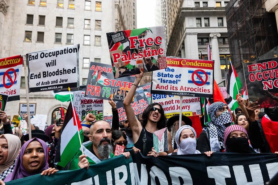 Supporters of Palestine hold a rally in New York's financial district as the fighting continues in Gaza on 26 October 2023 in New York City, US. (Spencer Platt/Getty Images/AFP)