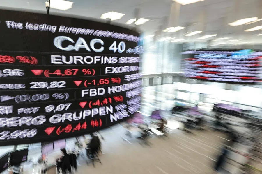 Market indicators are displayed on digital screen at the Euronext trading exchange building in La Defense business district, Paris, France, on 7 April 2025.