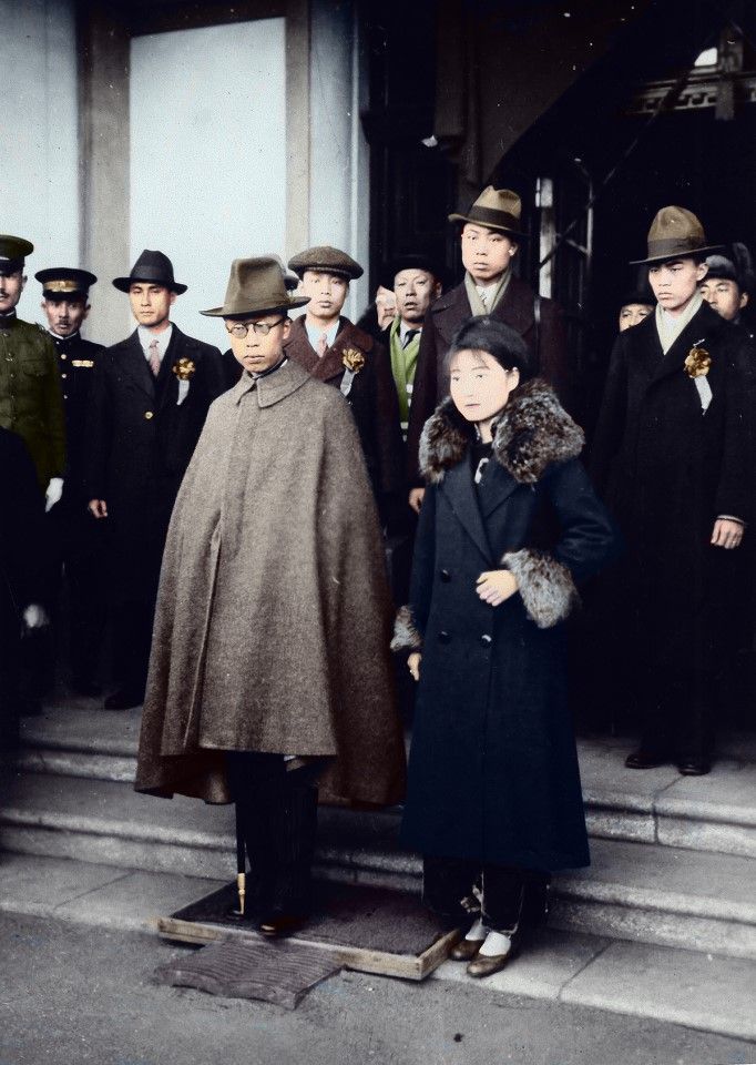 On 6 March 1932, Puyi and his wife met officials of the pseudo government at the Taisuikaku building in Tanggangzi, Manchukuo. Three days later, the installation ceremony was held at the governor's office (道尹衙门) in Changchun. The next day, Puyi and Kwantung commander-in-chief Shigeru Honjo signed a secret treaty leaving Manchukuo's defence and public order to Japan, with expenses borne by Manchukuo. This document recognised the total occupation of northeast China by the Kwantung army.