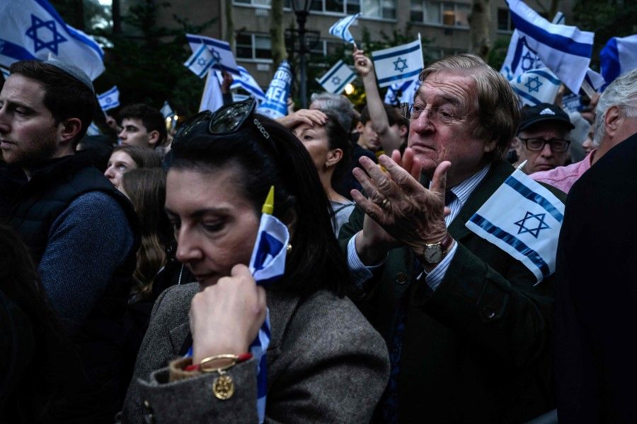 People attend a "Stand with Israel" vigil and rally in New York City on 10 October 2023, after the Palestinian militant group Hamas launched an attack on Israel. (Ed Jones/AFP)