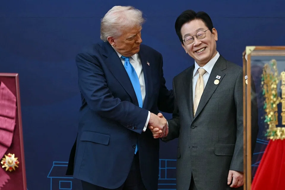 US President Donald Trump shakes hands with South Korean President Lee Jae-myung during a high honour presentation ceremony at the Gyeongju National Museum in Gyeongju on 29 October 2025. (Andrew Caballero-Reynolds/AFP)