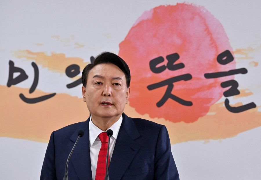 South Korea's president-elect Yoon Seok-youl speaks during a news conference at his transition team office, in Seoul, South Korea, 20 March 2022. (Jung Yeon-je/Pool via Reuters)
