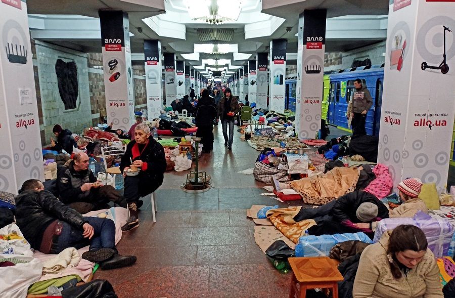 People shelter from shelling in a metro station, as Russia's attack on Ukraine continues, in Kharkiv, Ukraine, 10 March 2022. (Vitalii Hnidyi/Reuters)