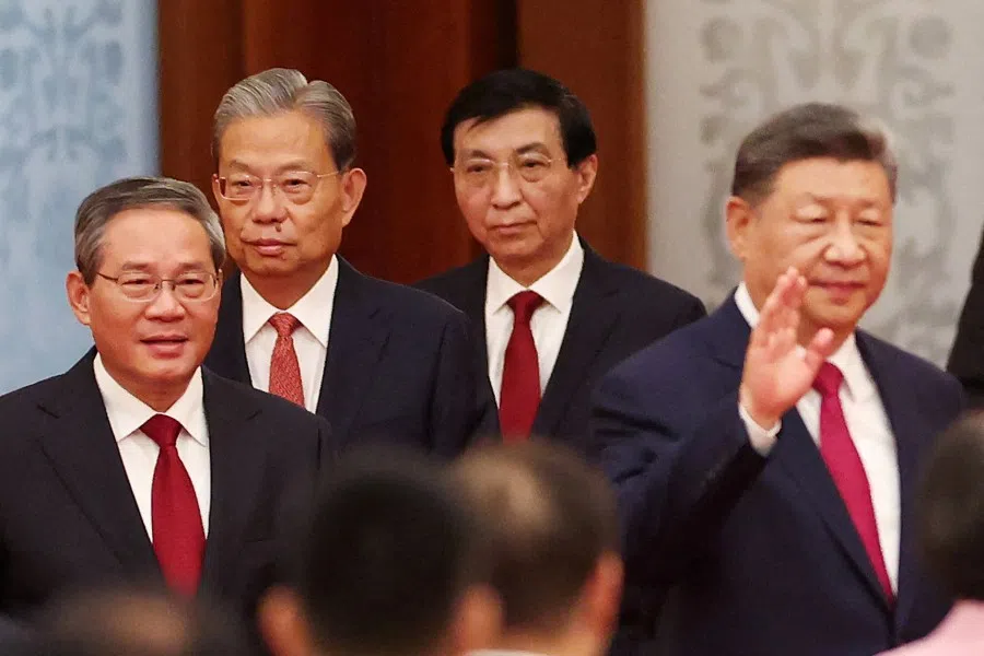China’s President Xi Jinping waves as China’s Premier Li Qiang, chairman of China’s National People’s Congress Standing Committee Zhao Leji and Chinese People’s Political Consultative Conference (CPPCC) chairman Wang Huning follow him, during the National Day reception on the eve of the 76th founding anniversary of the People’s Republic of China, at the Great Hall of the People in Beijing, China, on 30 September 2025. (Maxim Shemetov/Reuters)