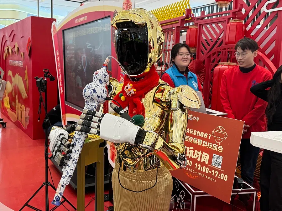 Chinese companies showcased their humanoid robots at a temple fair in Beijing, China, on 3 February 2025, including this one that has the finger dexterity to play an electric flute. (SPH Media)