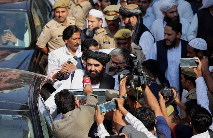 Afghanistan’s Taliban Foreign Minister Mawlawi Amir Khan Muttaqi gives interviews to media outside the guest house near the Darul Uloom Deoband, an Islamic seminary, in Deoband, Uttar Pradesh, India, 11 October 2025.