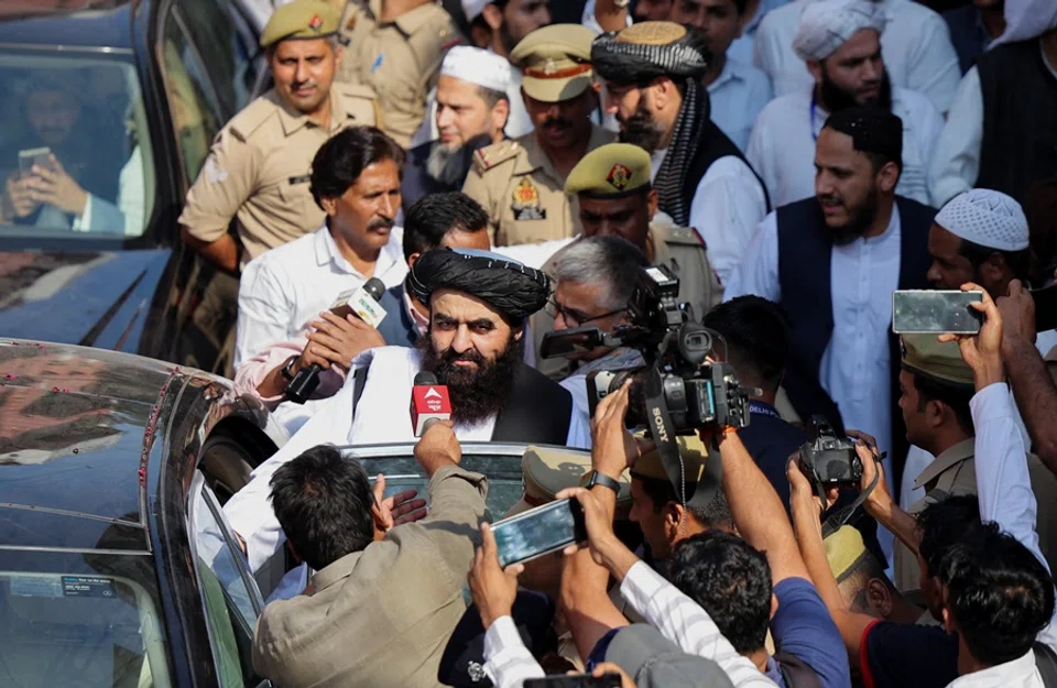 Afghanistan’s Taliban Foreign Minister Mawlawi Amir Khan Muttaqi gives interviews to media outside the guest house near the Darul Uloom Deoband, an Islamic seminary, in Deoband, Uttar Pradesh, India, 11 October 2025. (Anushree Fadnavis/Reuters)