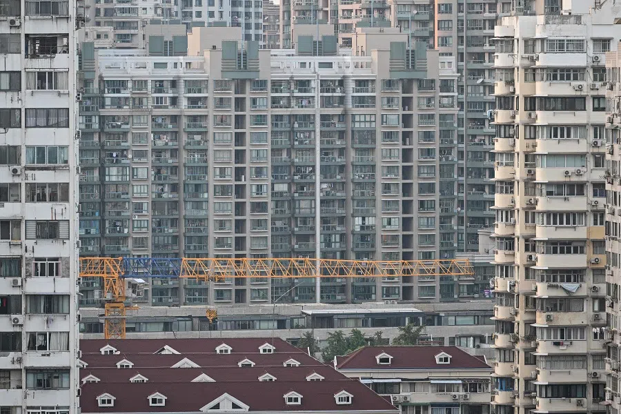 A general view shows buildings in a residential area in the Jing’an district in Shanghai, China, 28 September 2024. (Hector Retamal/AFP)