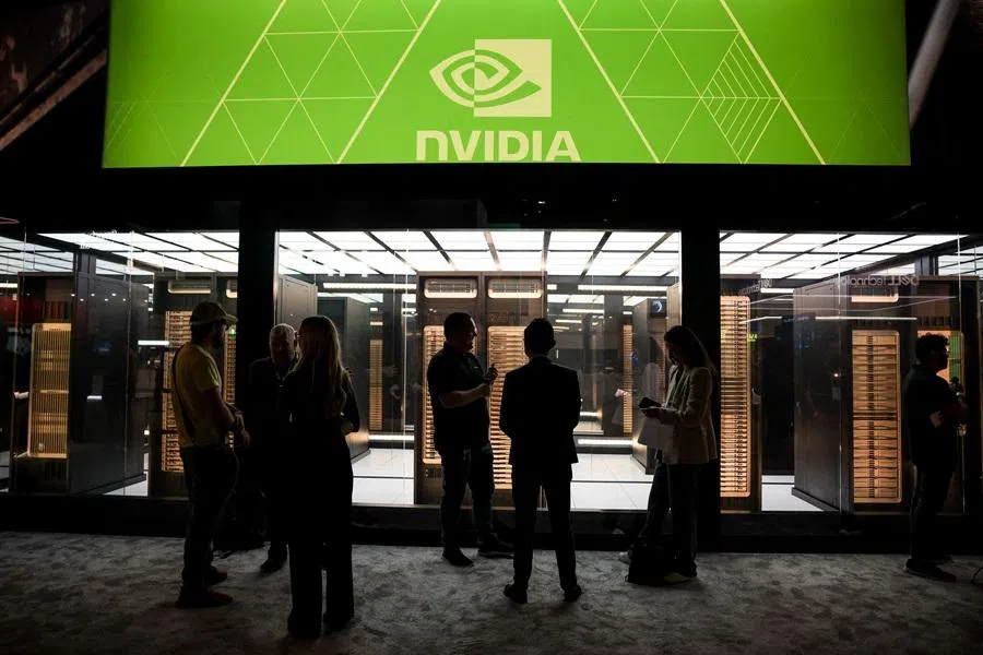 Guests tour the NVIDIA booth during the NVIDIA GTC global AI conference in San Jose, California, US, 17 March 2026. (Carlos Barria/Reuters)