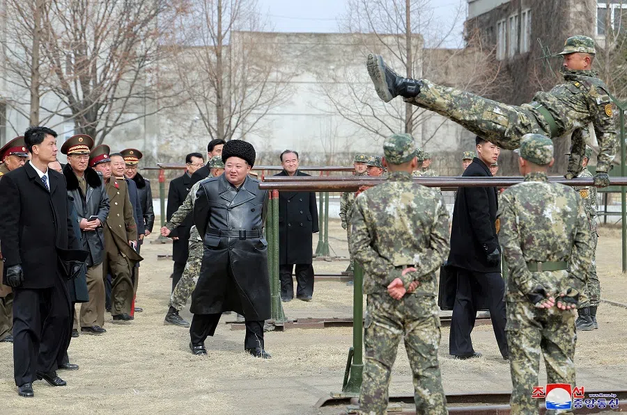 North Korean leader Kim Jong Un watches a cadet practicing on the parallel bars during his visit to the Kang Kon Military Academy, in Pyongyang, North Korea, on 25 February 2025, in this picture released by the Korean Central News Agency. (KCNA via Reuters)
